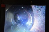 the inside of a water pipe shown on a monitor